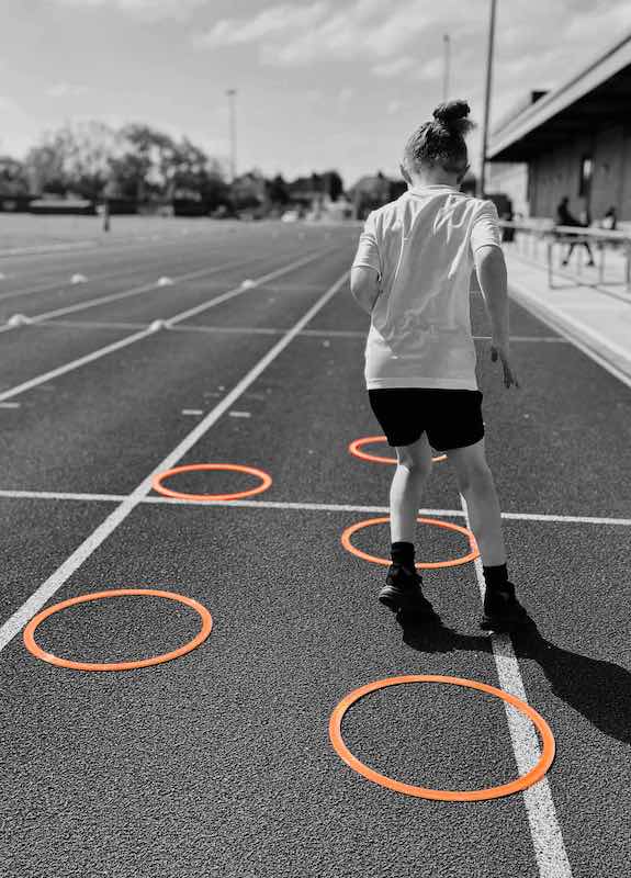 Child with speed hoops